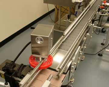 Modular packaging conveyor with spacer wheel by Deitz Pharmafill