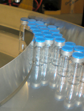 Pharmafill turntable with glass bottles