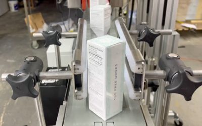 Heat Tunnel Shrinks Tamper-Evident Bands onto Rectangular Cartons